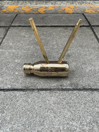 Gold V pen stand