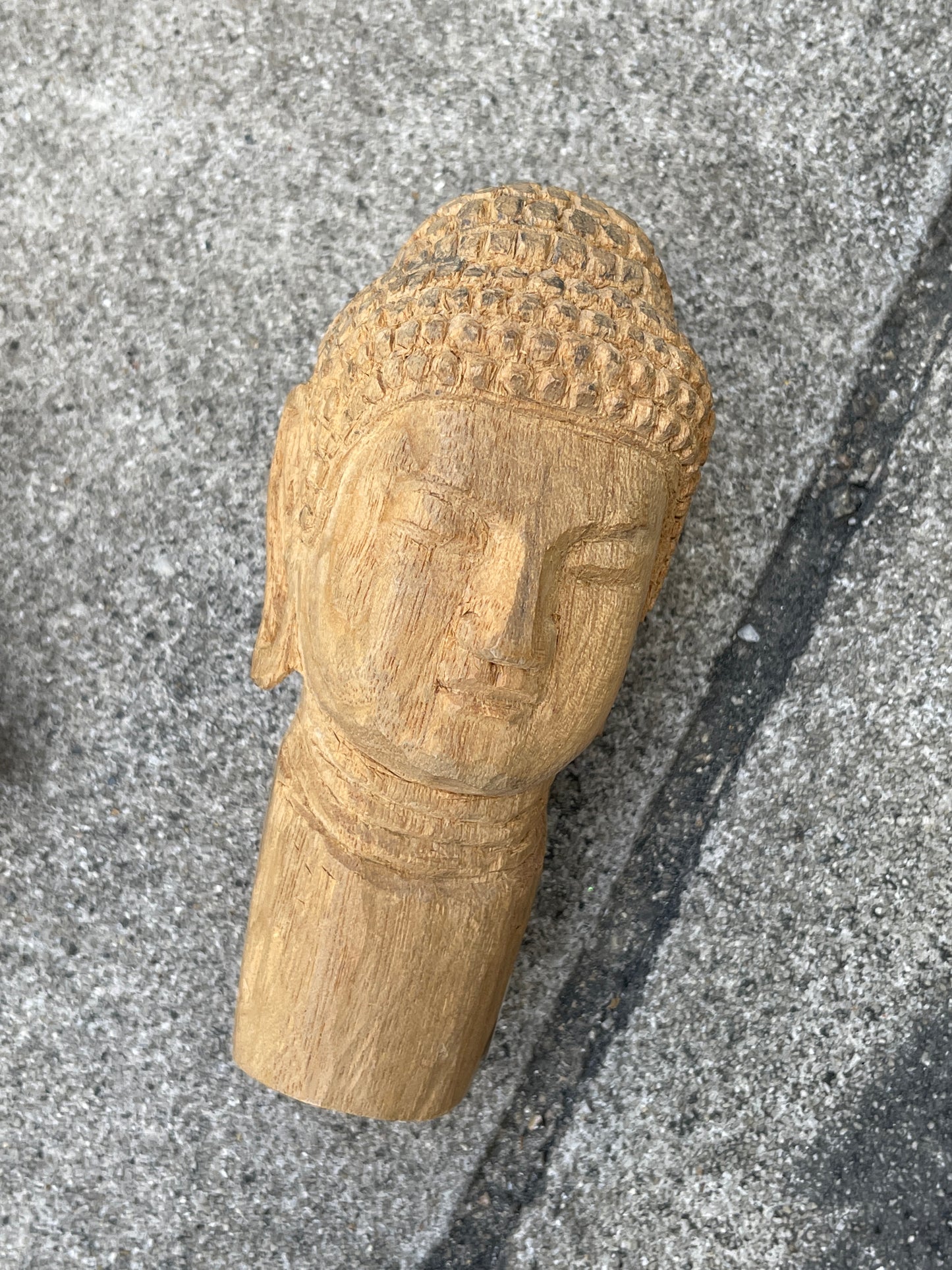 Wood buddha head